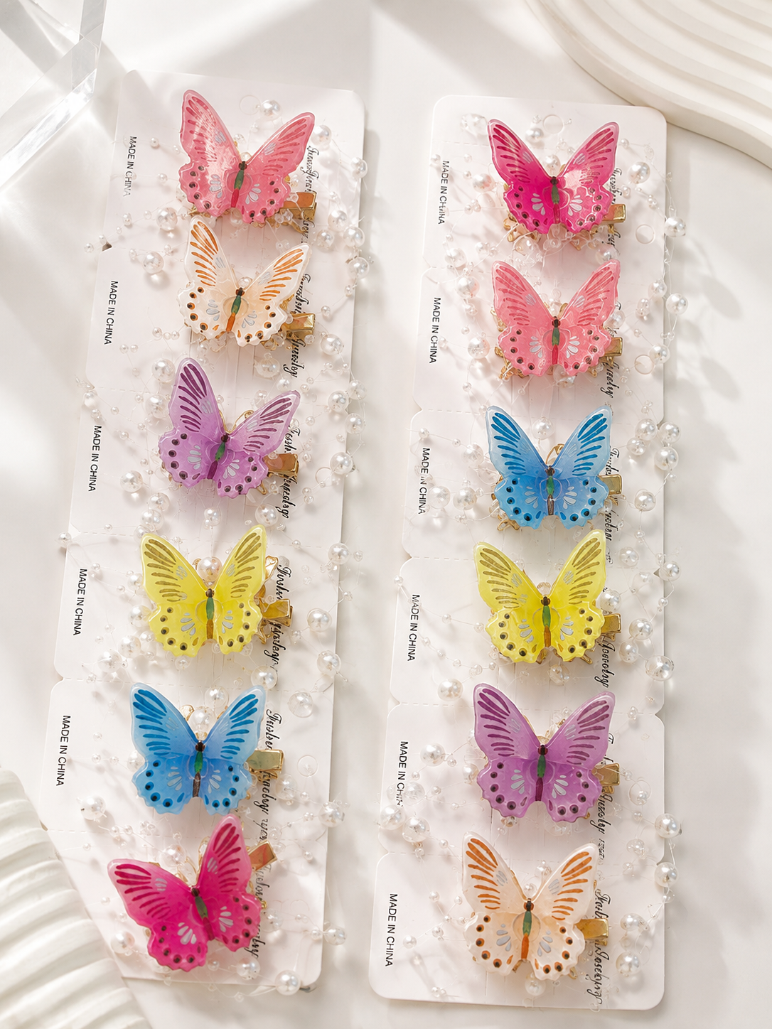 ETC-VIN-075 - Vincha metálica mariposa colores x 12