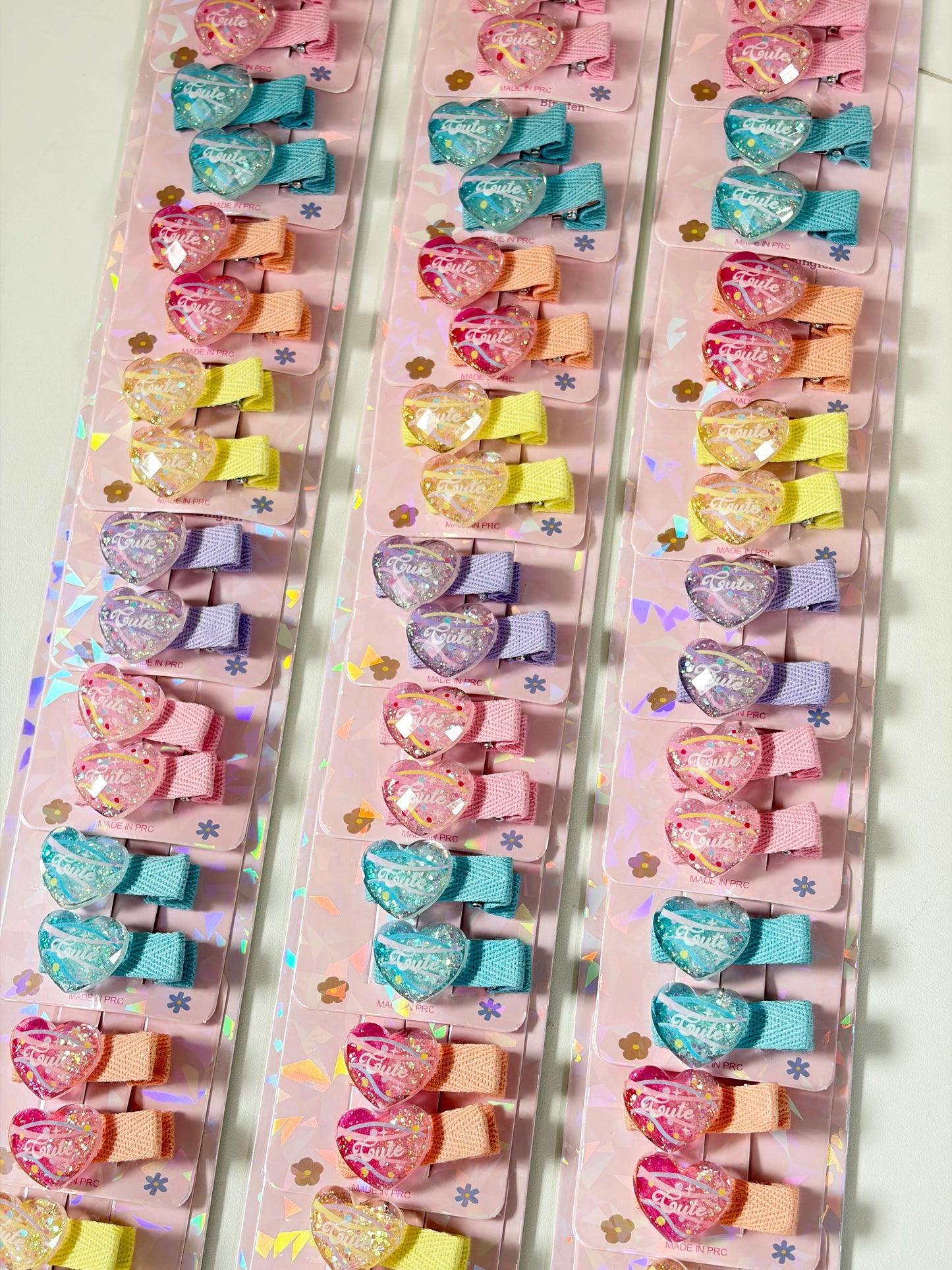 3583-2-4 - Tira x10 vinchas de corazones