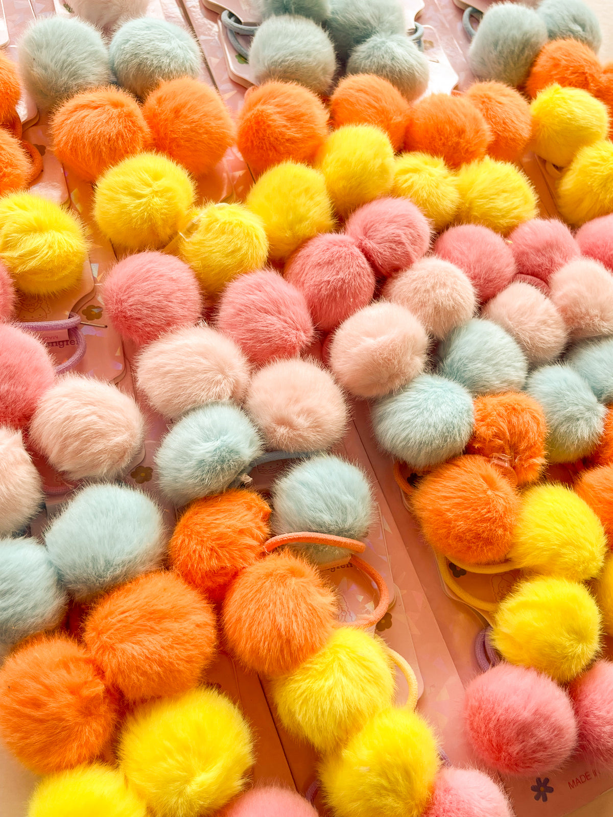 3583-12-2 - TIRA X 10 PARES DE MOÑO POMPOM