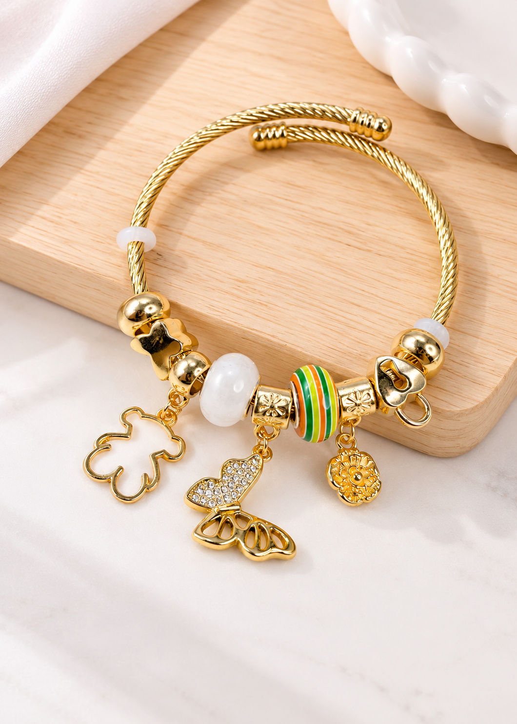 ETC-PUL-122 - PULSERA ESTILO PANDORA DE TOUS CON MARIPOSA EN DORADO