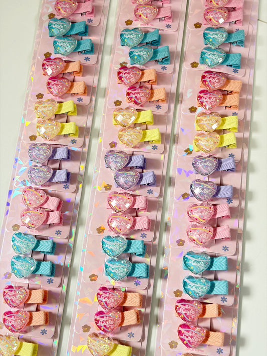3583-2-4 - Tira x10 vinchas de corazones