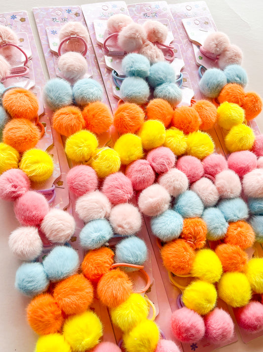 3583-12-2 - TIRA X 10 PARES DE MOÑO POMPOM