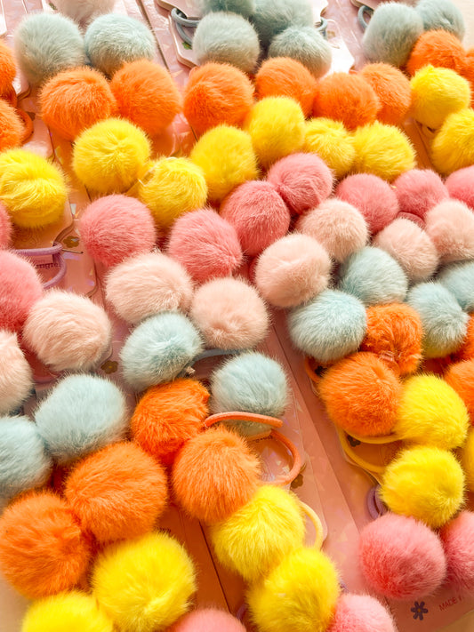 3583-12-2 - TIRA X 10 PARES DE MOÑO POMPOM